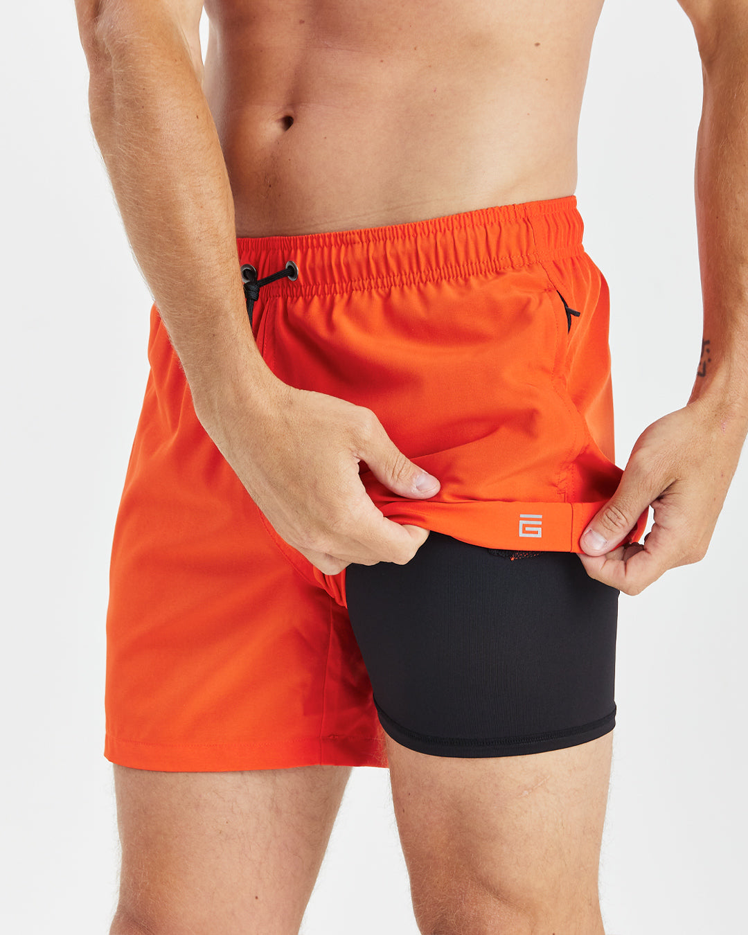 The Swim Short Compression Lined with Zip Pocket Sunset Orange